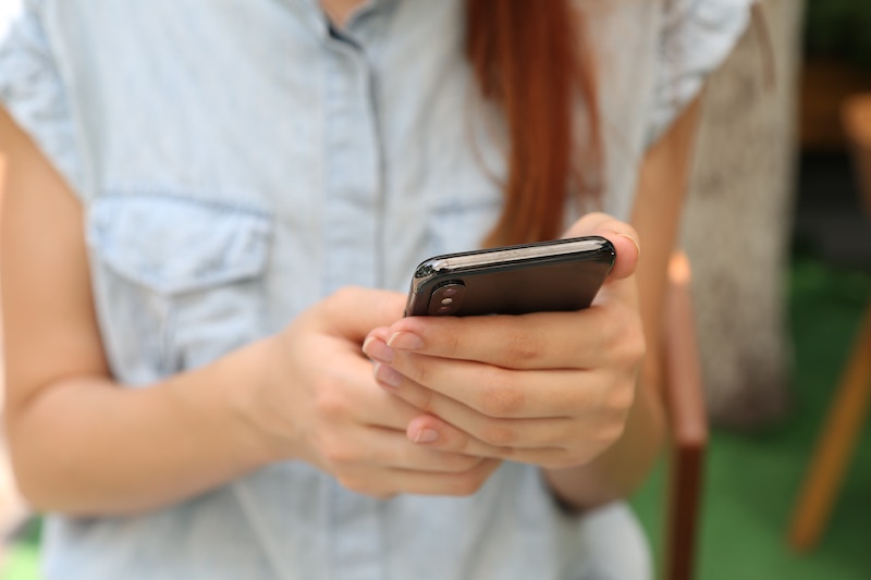 image of person holding an phone